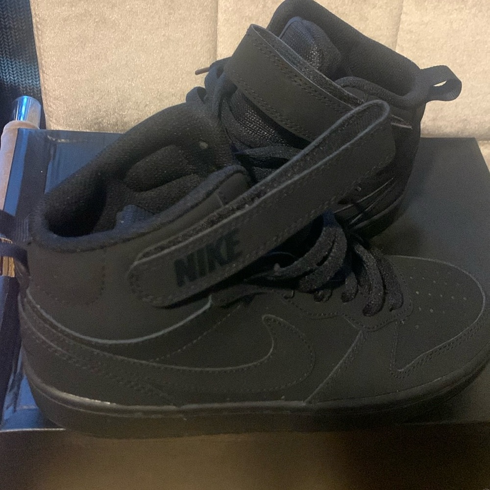 Brand new black on black Nike